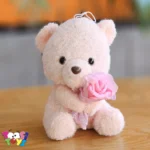 عروسک خرس اروپایی گل به دست
